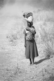 Zimbabwe - Woman Carrying Load on Head