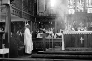 Priest Approaching Altar