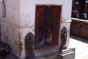 Nepal - Distressed Boy in Small Temple