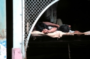 India - Men Sleeping in Loft Over Store