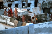 India - Women, Children, Animals on Roof