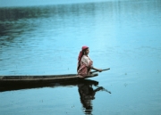 Kashmir - Woman on Shikara on Dal Lake